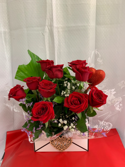 Send A Love Letter - 10 Red roses & lush foliage & baby’s breath arranged in a beautiful envelope shaped box